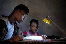 Kids studying with the Little Sun by Maddalena-Valeri-©-2012-Little-Sun