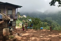 father and kids in Myanmar playing